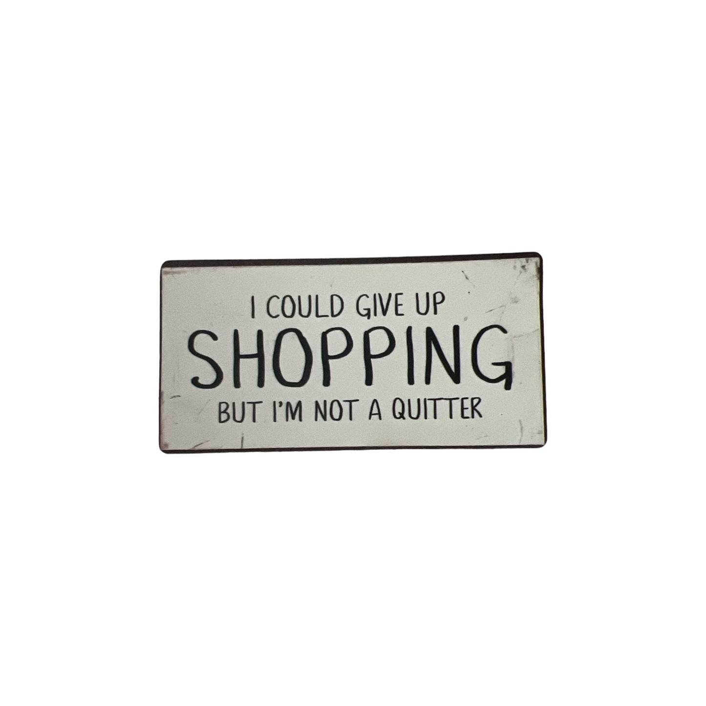 Magnet: I could give up shopping but I'm not a quitter
